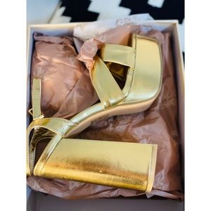 Gold platform heels